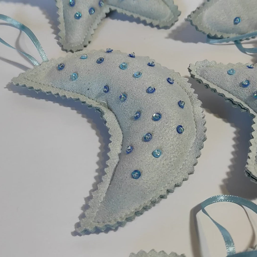 Adorno Navideño gamuzado celeste